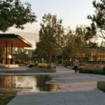 Knowledge Base: 10 Council pedestrian precinct showing a wet entrance, ramp, footpath and car park route requiring risk-based prioritisation